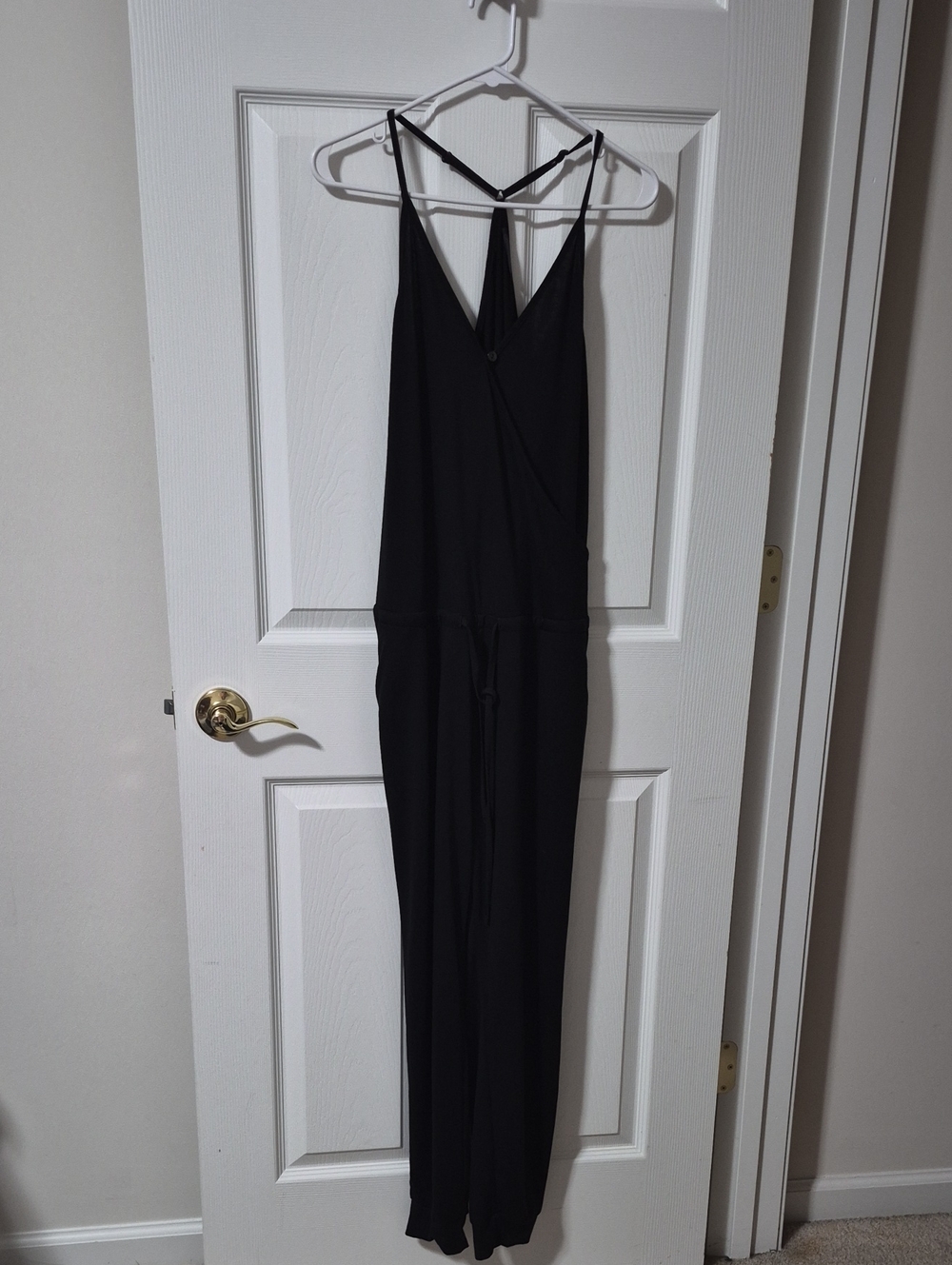 Sleeveless Black V-Neck Jumpsuit with Drawstring Waist